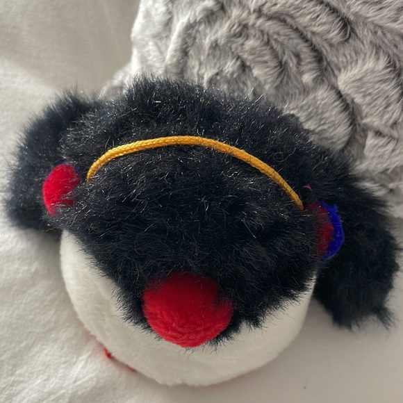 Gund penguin toy wearing earmuffs. Has a squeaker in its left flipper. rare - Picture 2 of 6